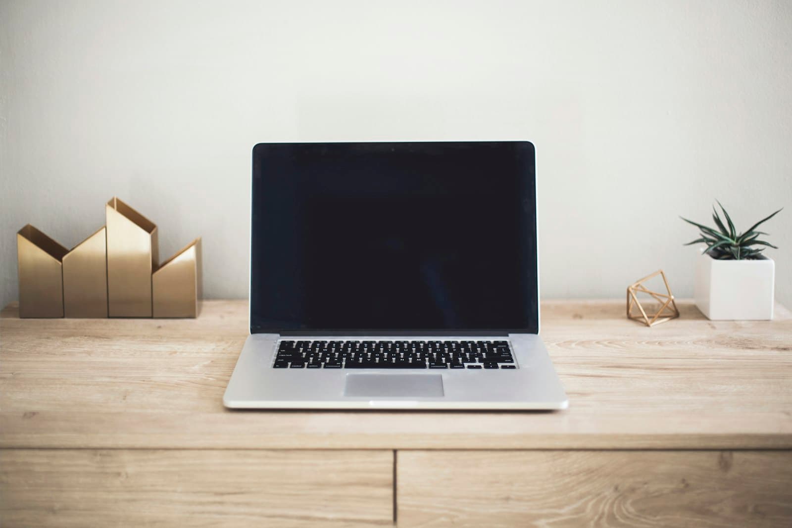 Tidy desk with an open laptop, ready to work
