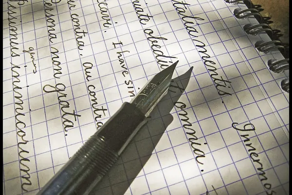 Fountain pen on a page of handwritten notes